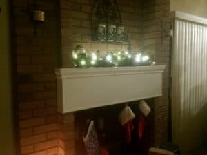 Finished and decorated custom fireplace mantle.