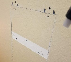 Large drywall hole repaired
