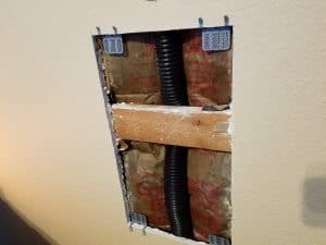 Repairing a large drywall hole - adding drywall repair clips