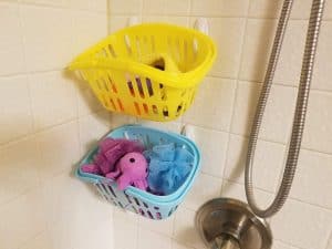 Bath toy storage with Dollar Store baskets and Command Hooks