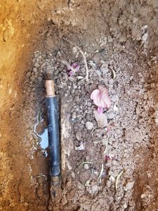Replacing the old, broken irrigation tube tube with new.